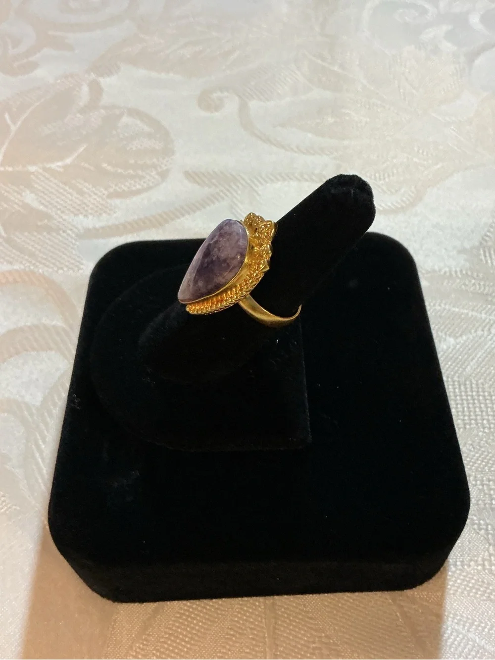 Amethyst Gold Tone Ring adorn your
